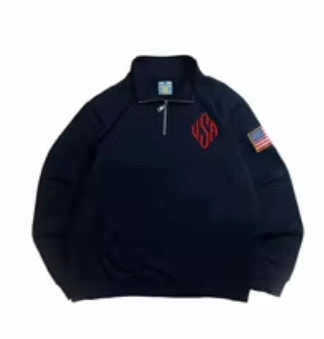 Navy USA monogram quarter-zip pullover with flag sleeve patch